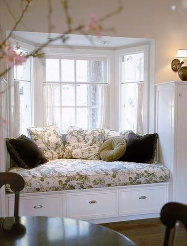 a chic looking window seat with under the seat storage for shoes and extra items.