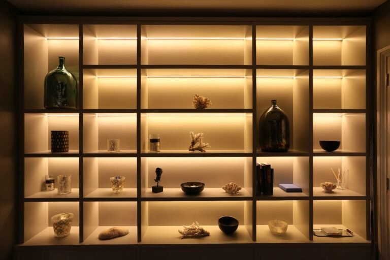 wall embedded square shelves used for displaying decoration pieces and hidden storage space for small bedroom to leave the floor area more unused.